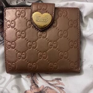 Gucci Embossed Brown Wallet with Gold Heart
